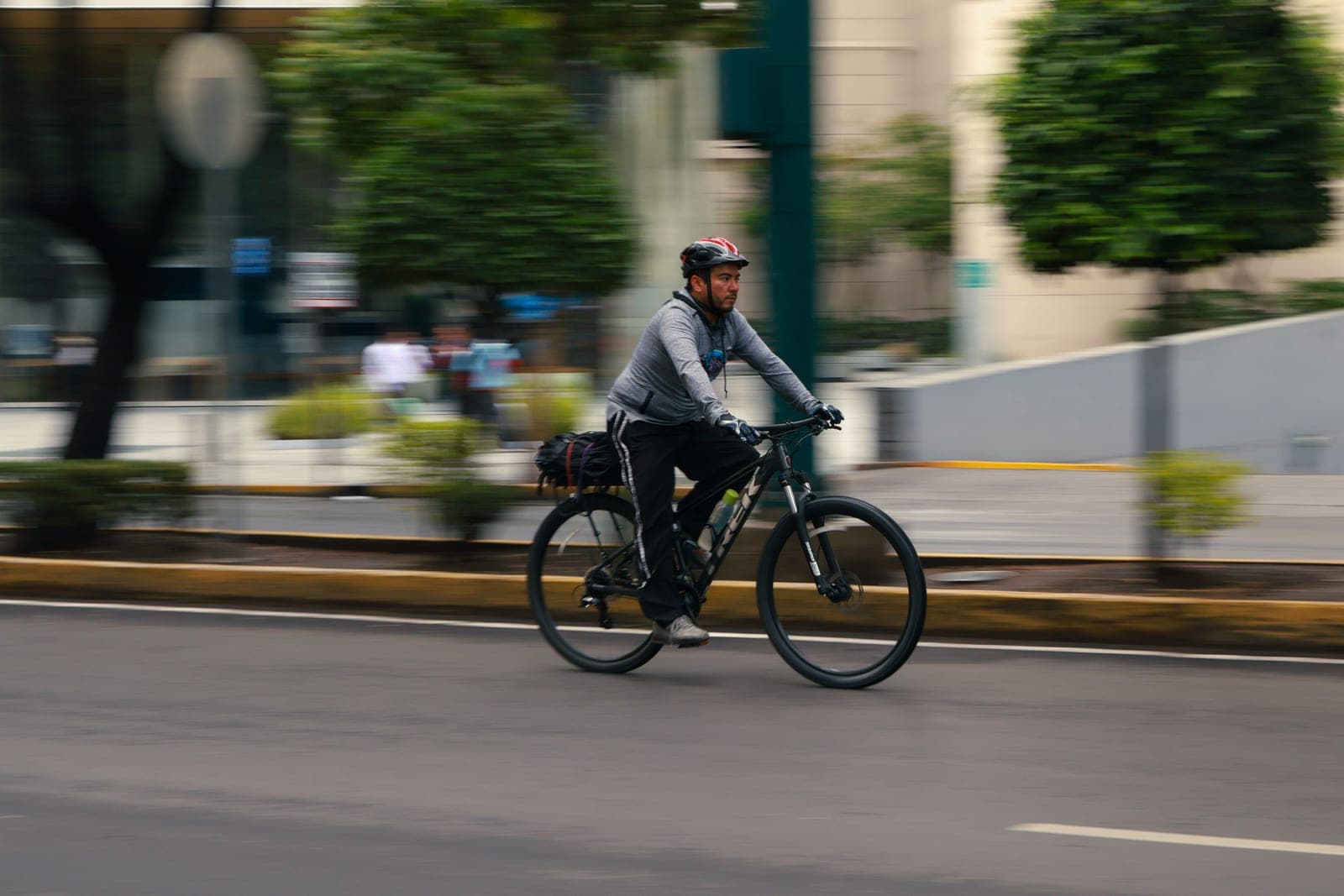 A bicycle on a city street in early morning light.