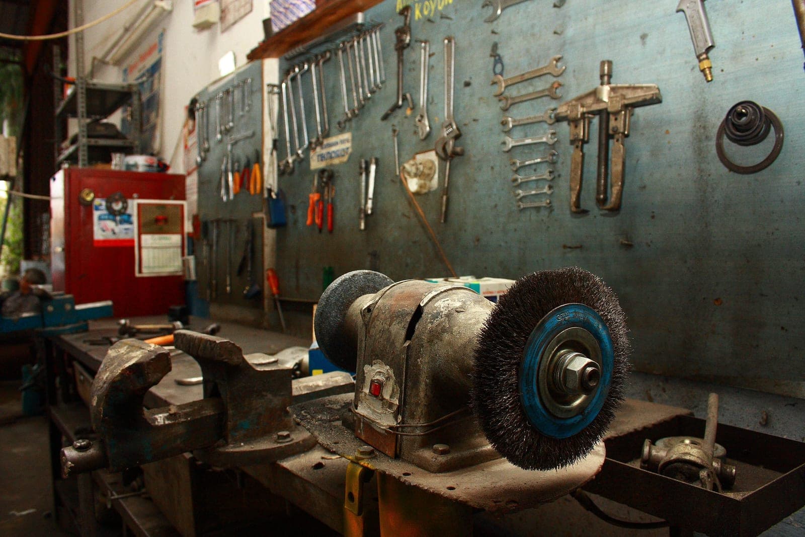 Bicycle tools laid out on a workshop bench.